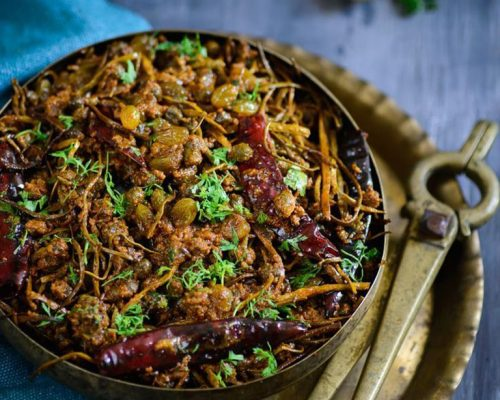 A bowl of Ker Sangri, the iconic foraged desert dish essential to a Rajasthan culinary journey.