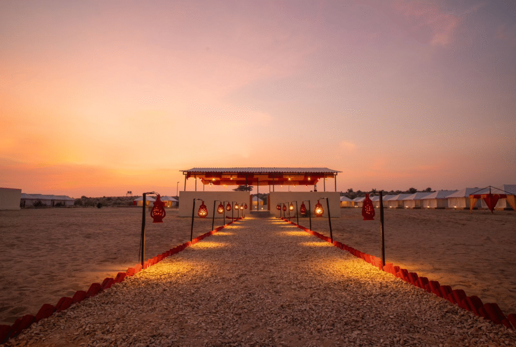The arched entrance to Rumi's Desert Camp, a gateway to the authentic dining and cultural experiences of a Rajasthan culinary journey.